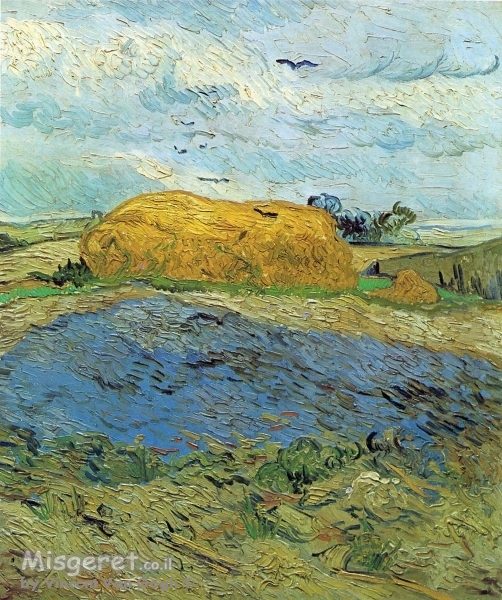 haystack under  rainy sky