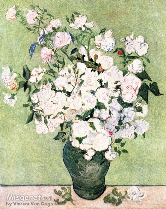a vase of roses