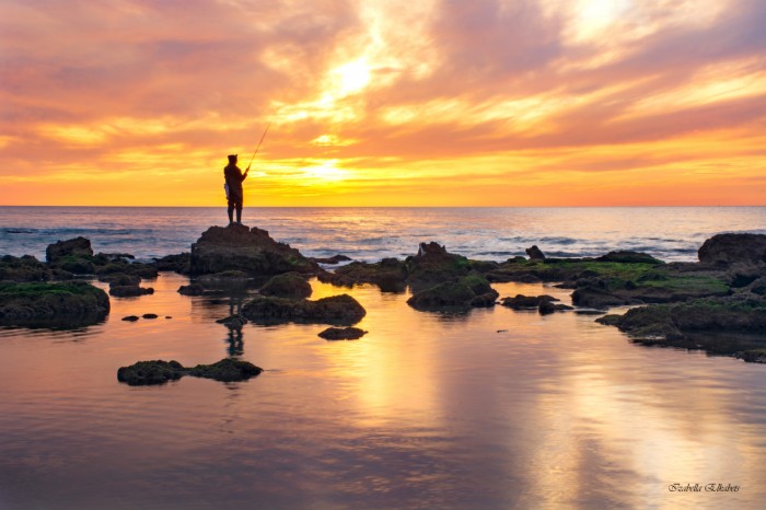 דייג בשקיעה