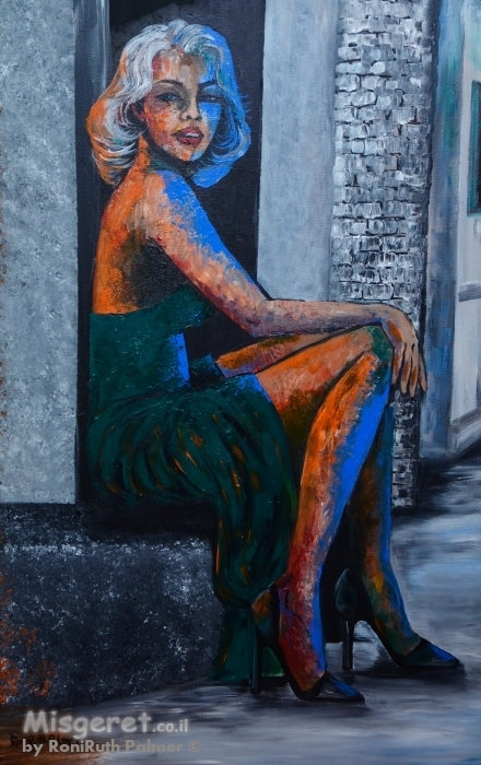 אישה יושבת בצג הדרך